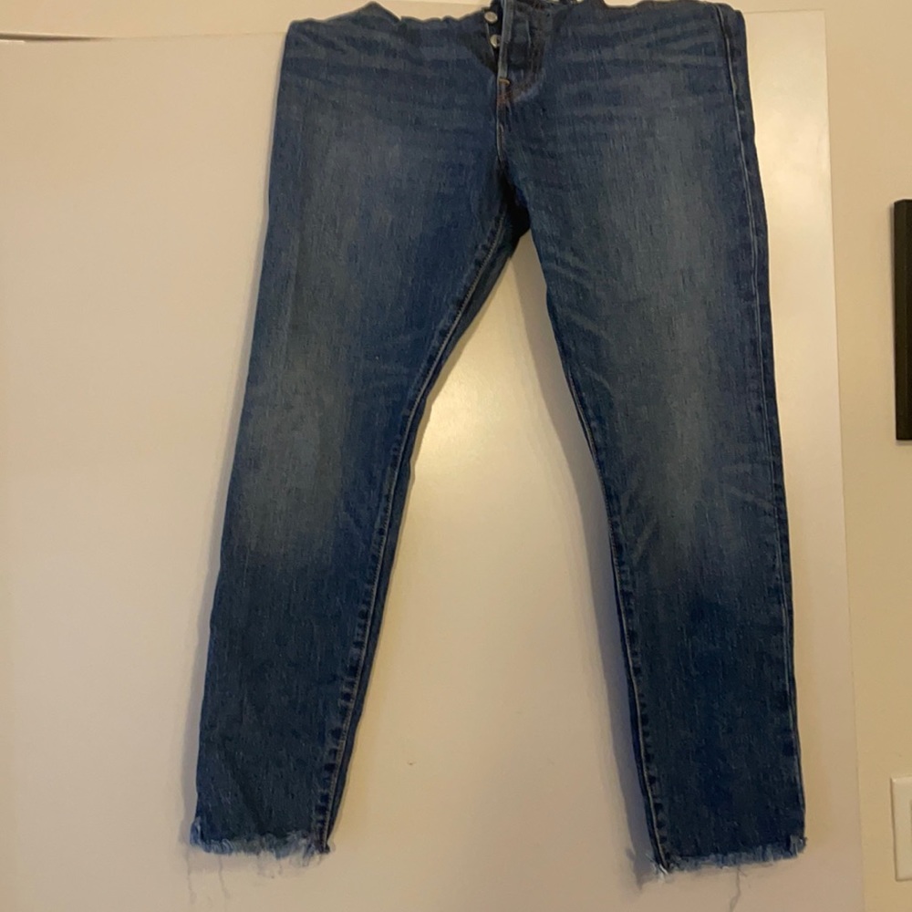 White oak Levi’s with taken in legs